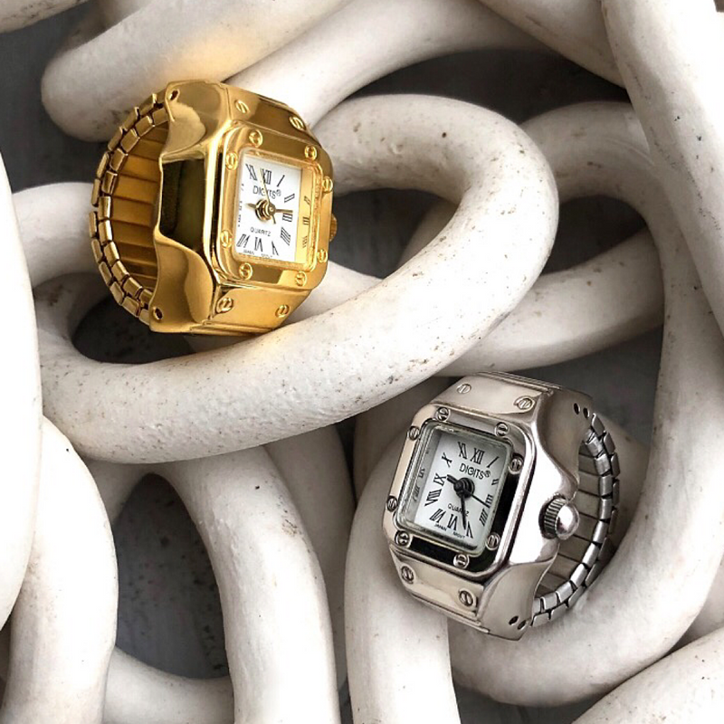 Stellar Radiance Finger Ring Watches in Gold and Silver by DIGITS